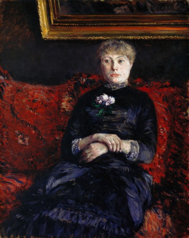 Woman Seated on a Red Floral Sofa, 1880 | Caillebotte